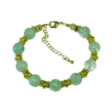 AMRIT  Bracelet en plaqué or avec pierres semi-précieuses Jade facettes.